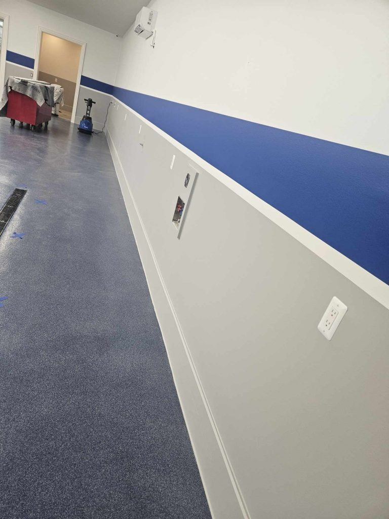 Epoxy floor with painted accent stripe